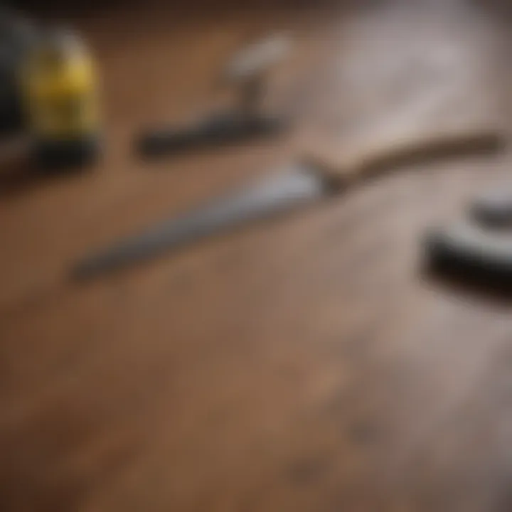 Tools and materials laid out for refinishing wood floors, including sanders and finishes