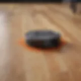 High-performance suction robot vacuum in action on a hardwood floor