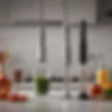 Various immersion stick blender models displayed on a countertop