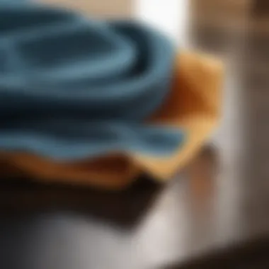 Microfiber Cloth in Action A close-up of a microfiber cloth efficiently cleaning a surface.