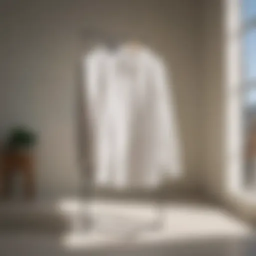 A pristine white shirt hanging to dry in natural light, showcasing its brightness.