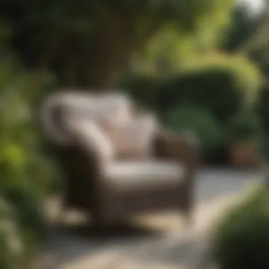 Stylish Hampton Wicker Outdoor Club Chair in a Garden Setting Stylish Hampton wicker outdoor club chair in a garden setting