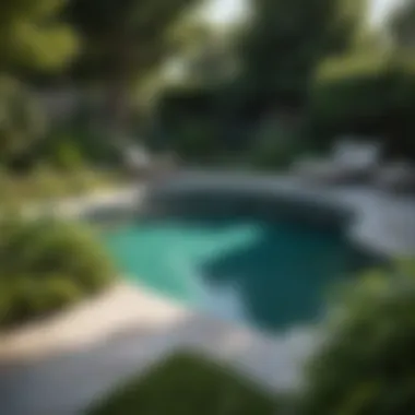 Elegant Small Inground Pool Amidst Lush Garden An elegant small inground pool integrated with a vibrant garden