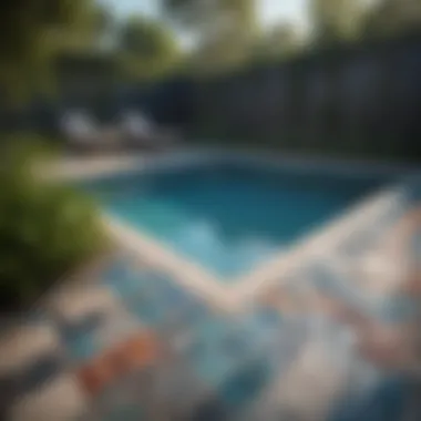 Stylish Small Inground Pool with Unique Tile Work A stylish small inground pool featuring unique tile designs