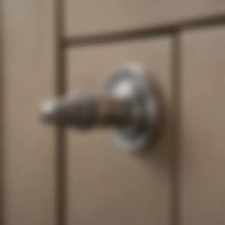 Close-up of a cabinet handle being installed with care