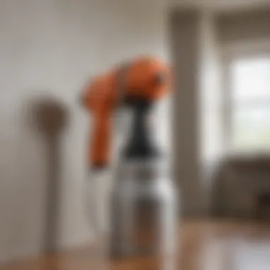 Close-up of a paint sprayer in action