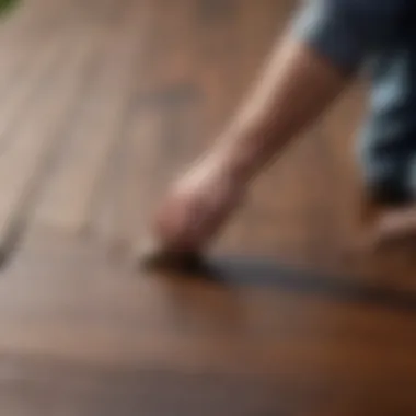 Application of a stain on a deck surface with a brush, demonstrating craftsmanship