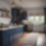 Elegant kitchen featuring contrasting navy and white cabinets