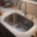 A close-up view of a garbage disposal unit under a kitchen sink.